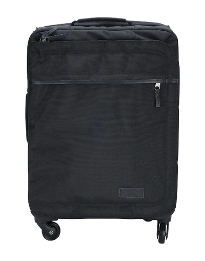 Shop Eastpak Wheeled Luggage In Black