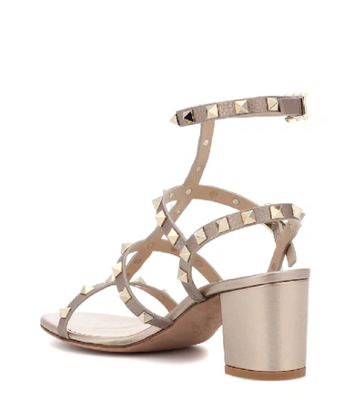 Shop Valentino Garavani Rockstud Leather Sandals In Gold