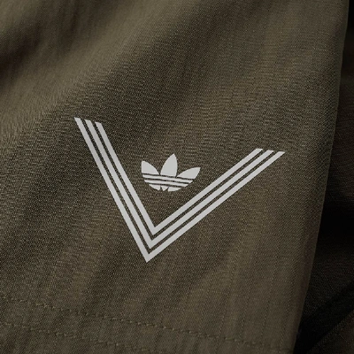 Shop Adidas X White Mountaineering 6 Pocket Pant In Green