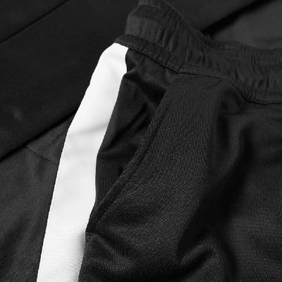 Shop Nike Tribute Pant In Black