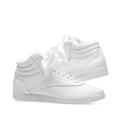 Shop Reebok Freestyle Hi Satin Bow W In White