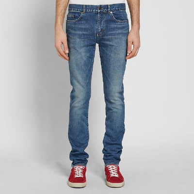 Shop Saint Laurent Low Rise Skinny Jean In Blue