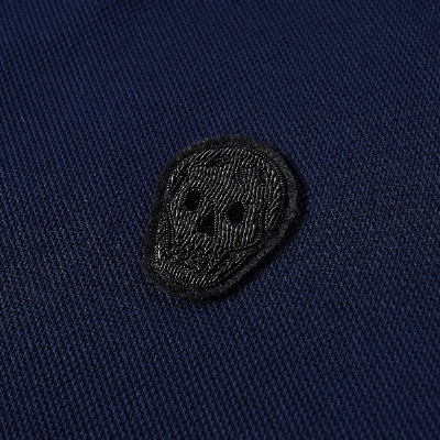 Shop Alexander Mcqueen Embroidered Skull Badge Polo In Blue