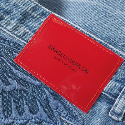 Shop Marcelo Burlon County Of Milan Marcelo Burlon Blue Wing Slim Jean
