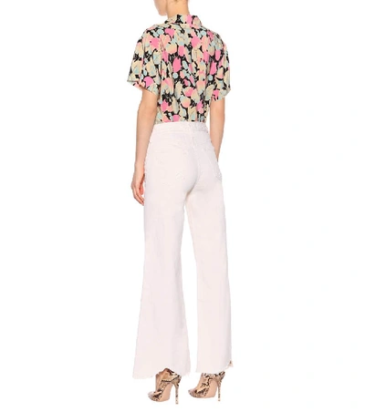 Shop Mother Tomcat Flared Jeans In White