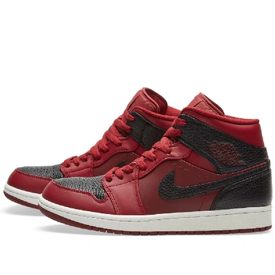 Shop Nike Air Jordan 1 Mid In Red