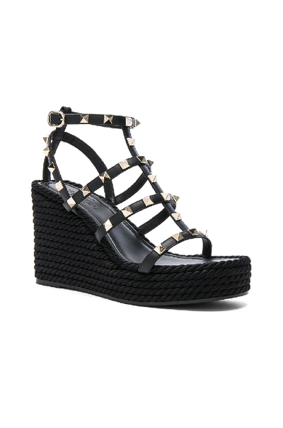 Valentino Rockstud Ankle Strap Wedge Sandal In Calfskin Leather 95 Mm In Black