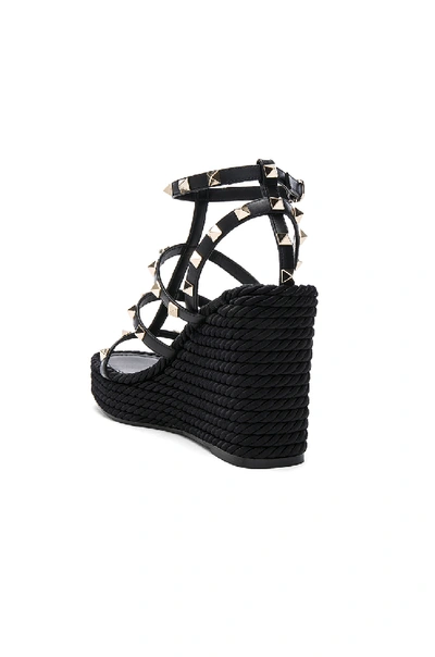 Valentino Rockstud Ankle Strap Wedge Sandal In Calfskin Leather 95 Mm In Black
