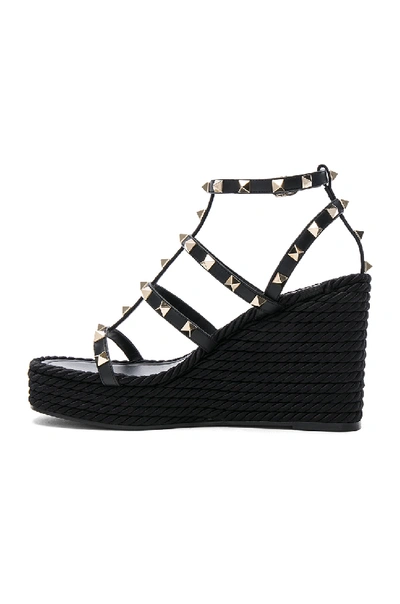 Valentino Rockstud Ankle Strap Wedge Sandal In Calfskin Leather 95 Mm In Black