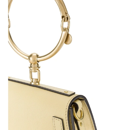 Shop Chloé Yellow Nile Bracelet Bag