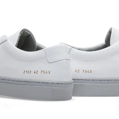 Shop Common Projects Achilles Low Coloured Sole In White