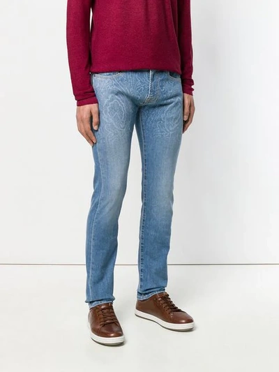 printed slim leg jeans