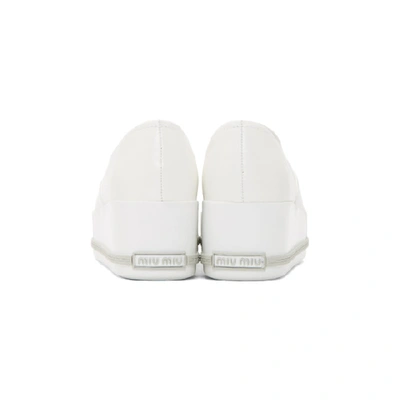 Shop Miu Miu White Cap Toe Platform Slip-on Sneakers In 009 White