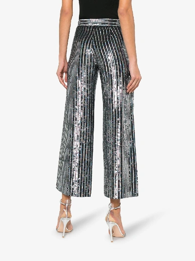 Shop Ashish Sequin Embellished Stripe Flared Cropped Trousers In Black