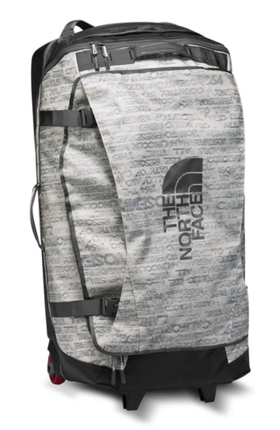 Shop The North Face Rolling Thunder Wheeled Duffel Bag - White In Moonlight Ivory Scratch Print
