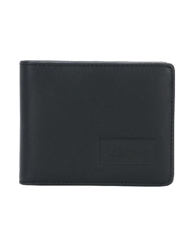 Shop Eastpak Wallet In Black