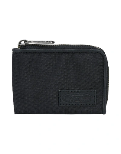 Shop Eastpak Wallet In Black