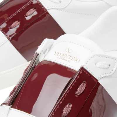 Shop Valentino Open Low Top Patent Sneaker In White