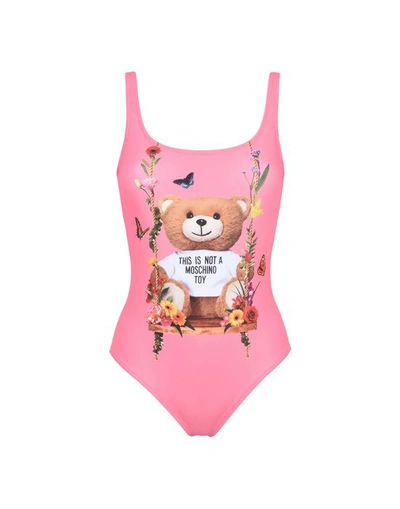 Shop Moschino One-piece Suits In Fuchsia