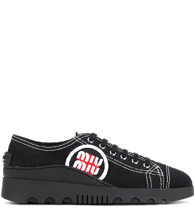Shop Miu Miu Low-top Canvas Sneakers In Black