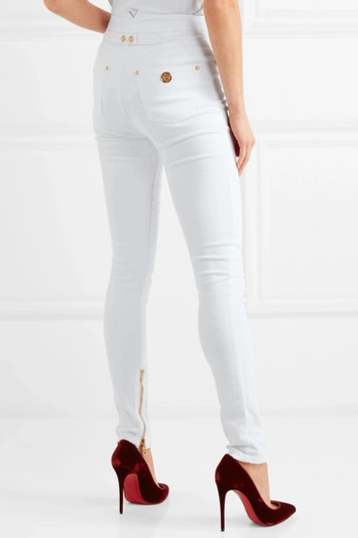 Shop Balmain Button-embellished High-rise Skinny Jeans In White