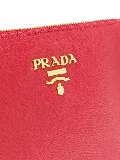 Shop Prada Logo Clutch Bag - Red