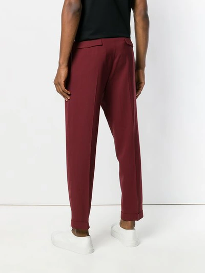 Shop Prada Tapered Tailored Trousers In Red