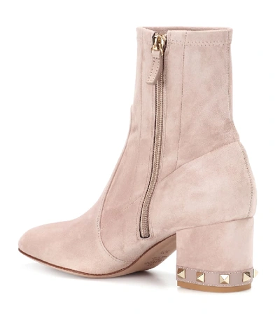 Shop Valentino Rockstud Suede Ankle Boots In Beige