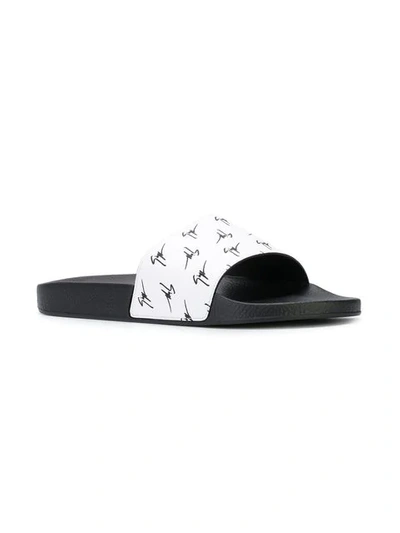 Shop Giuseppe Zanotti Logo Printed Burel Slides In White