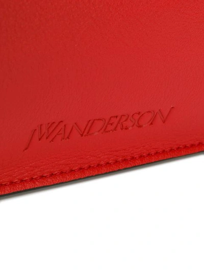 Shop Jw Anderson Pierced Shoulder Bag - Red