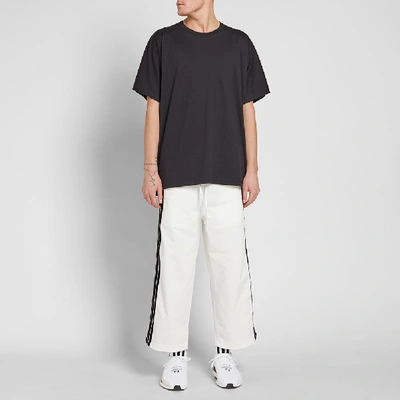 Shop Dima Leu Cropped Wide Fit Stripe Track Pant In White