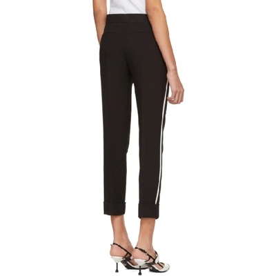 Shop Prada Black And White Side Band Trousers In F057z Black