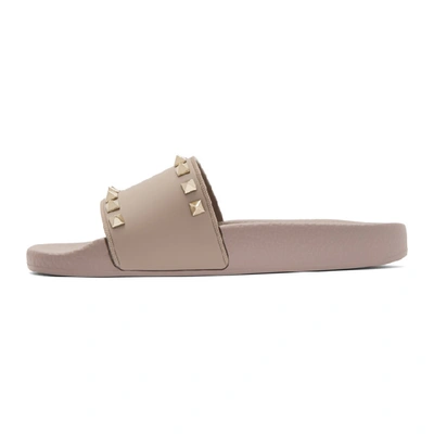 Shop Valentino Pink  Garavani Rockstud Slides In P45 Poudre