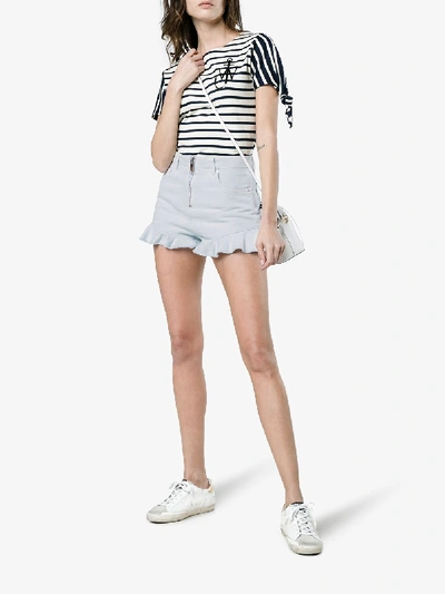 Shop Msgm Denim Shorts With Frill In Blue