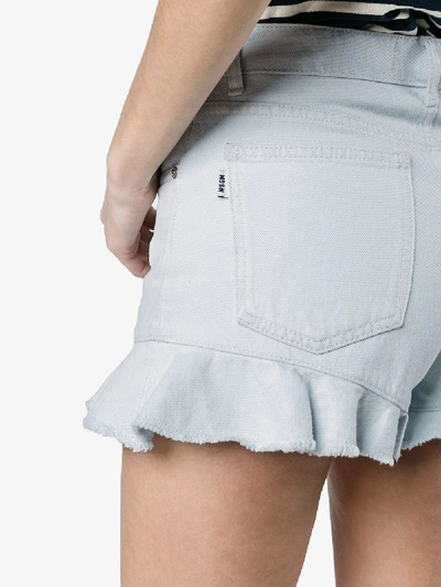 Shop Msgm Denim Shorts With Frill In Blue