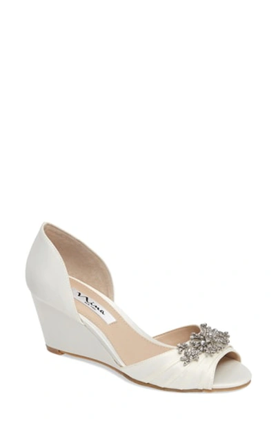 Shop Nina Emiko D'orsay Wedge Pump In Ivory Satin