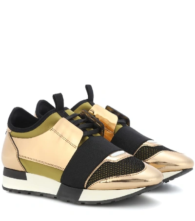 Shop Balenciaga Race Runner Sneakers In Gold