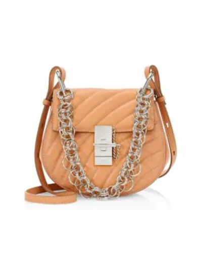 Shop Chloé Small Drew Quilted Leather Saddle Bag In Blush