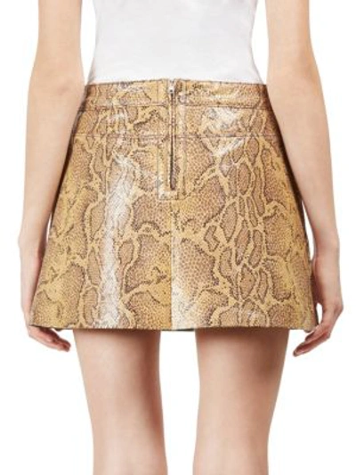Shop Chloé Python Print Leather Mini Skirt In Luminous Ochre