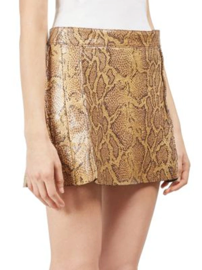 Shop Chloé Python Print Leather Mini Skirt In Luminous Ochre