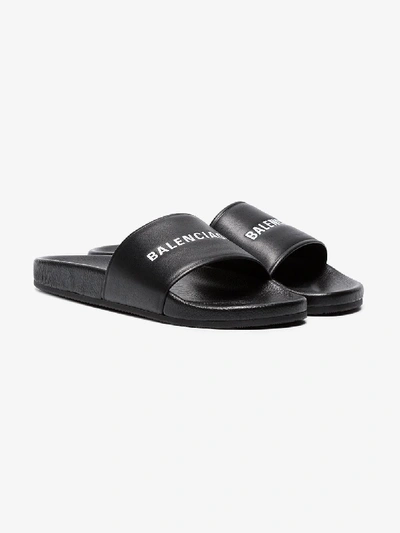 Shop Balenciaga Logo Leather Slides In Black