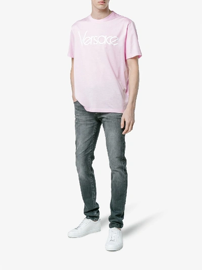 Shop Versace Logo Print Short Sleeve T Shirt In Pink&purple