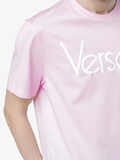 Shop Versace Logo Print Short Sleeve T Shirt In Pink&purple