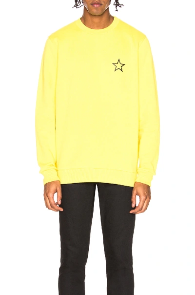 Shop Givenchy Star Crewneck Sweatshirt In Yellow
