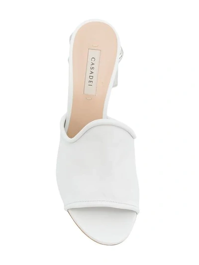 Shop Casadei Chain Embellished Mules - White