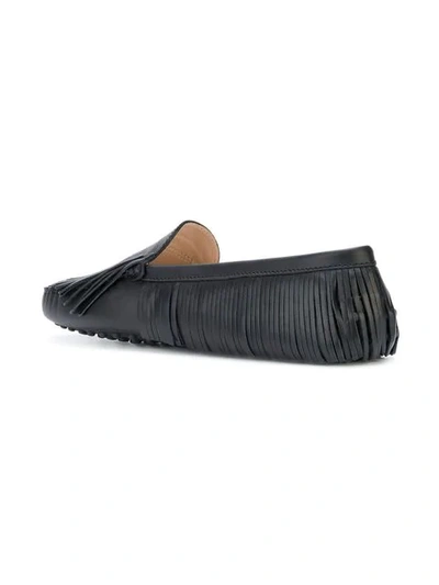 Shop Tod's Fringed Slip-on Loafers In Black