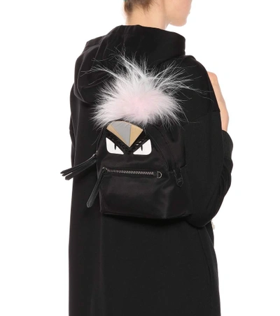 Shop Fendi Fur-trimmed Mini Backpack In Black