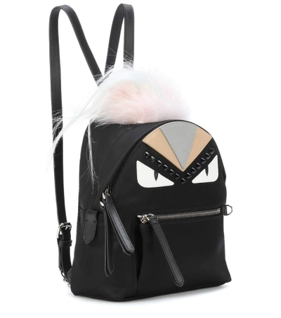 Shop Fendi Fur-trimmed Mini Backpack In Black