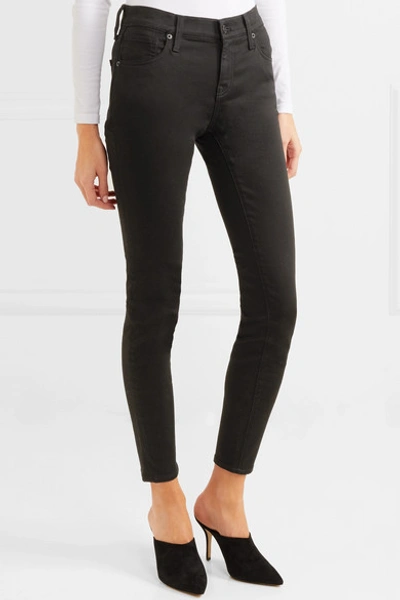 Shop Madewell Mid-rise Skinny Jeans In Black