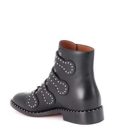 Shop Givenchy Embellished Leather Boots In Black